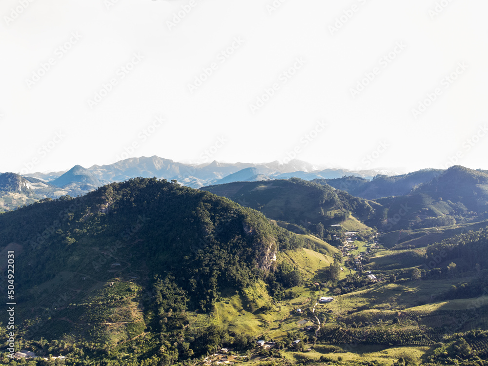 Obraz premium beautiful green valley with coffee, eucalyptus and banana plantation, drone aerial view - Venda Nova, Espirito Santo, Brazil