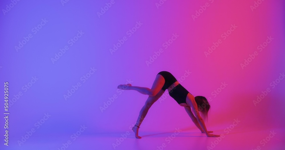 Blonde woman doing yoga in studio closeup Blonde woman doing yoga in studio closeup