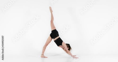 Blonde woman doing yoga in studio closeup © Sved Oliver