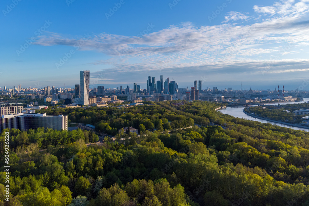 Aerial view of Vorobyovy Gory park and Moscow city on sunny spring morning, Russia. Aerial view of Vorobyovy Gory park and Moscow city on sunny spring morning, Russia.
