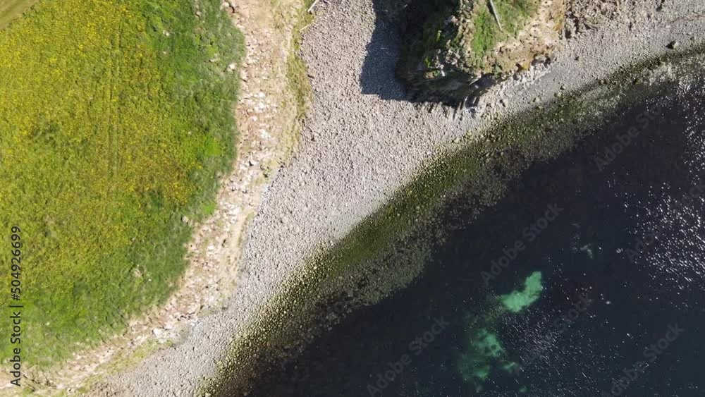 Aerial view of cliffs and ocean in Grimsey Island Arctic Circle Iceland Aerial view of cliffs and ocean in Grimsey Island Arctic Circle Iceland