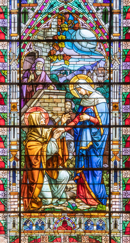 VALENCIA, SPAIN - FEBRUAR 17, 2022: The Visitation in neo-gothic stained glas...