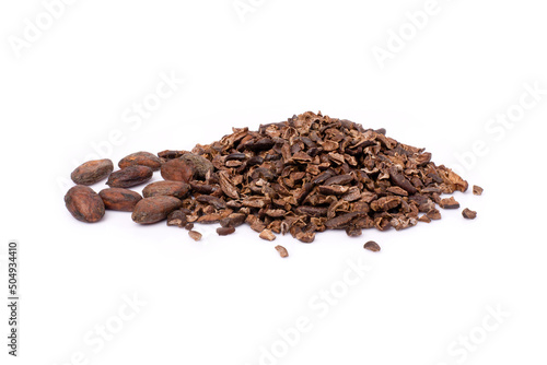 Pile of cocoa nib with dry cacao beans isolated on white background.