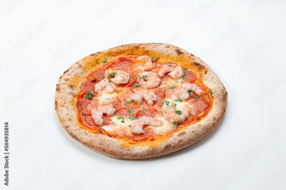 Homemade pizza with shrimp. On a light background.