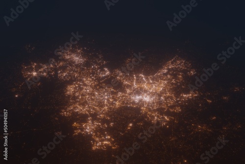 Aerial shot of Raleigh (North Carolina, USA) at night, view from south. Imitation of satellite view on modern city with street lights and glow effect. 3d render