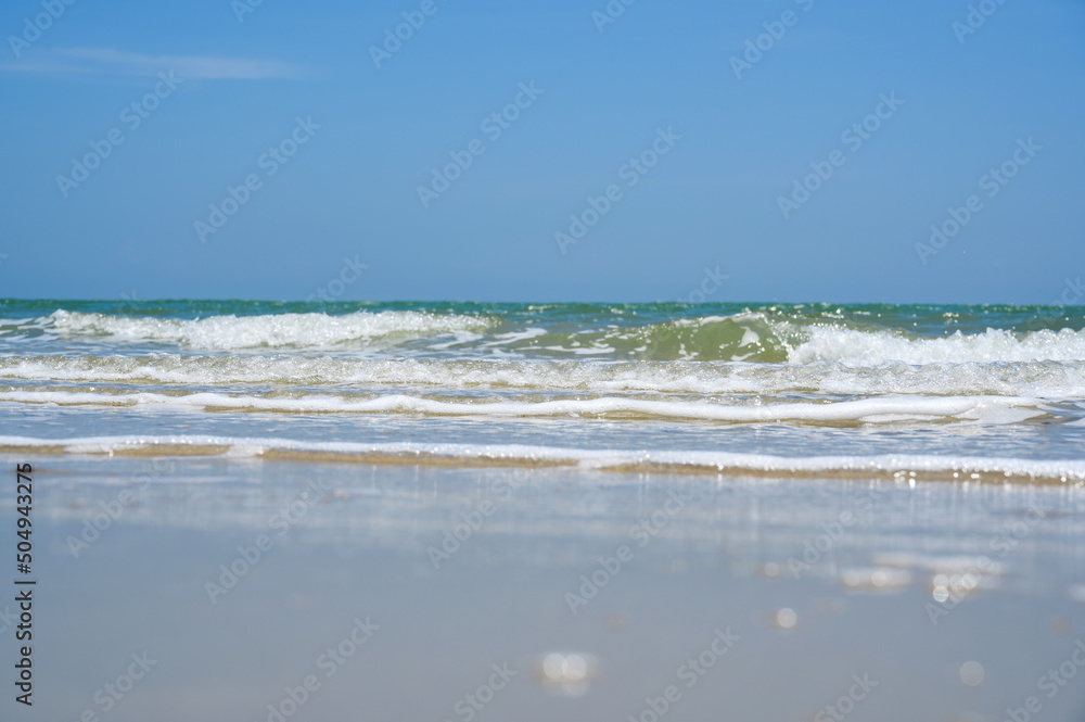 soft wave on sandy beach seaside. summer vacation activity background concept. soft wave on sandy beach seaside. summer vacation activity background concept.