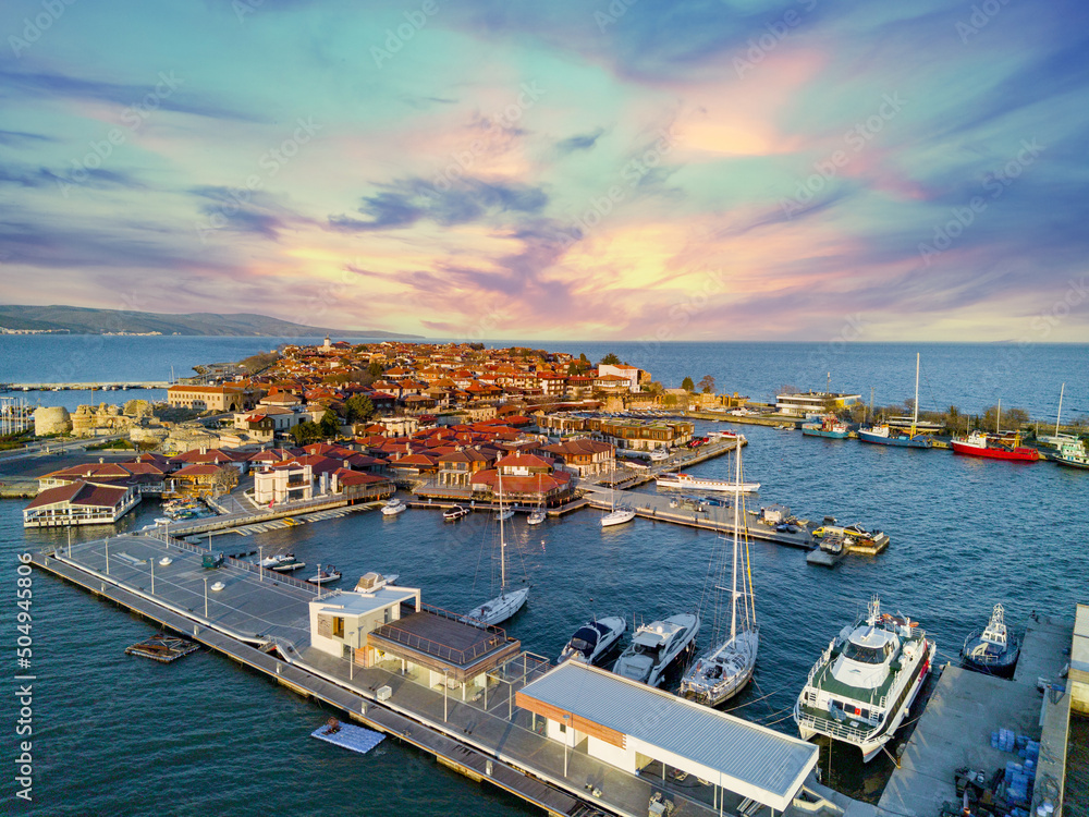 Panorama view from a height of the city of Nessebar with houses and parks washed by the Black Sea in Bulgaria