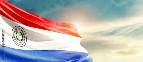 Paraguay national flag cloth fabric waving on the sky - Image photo