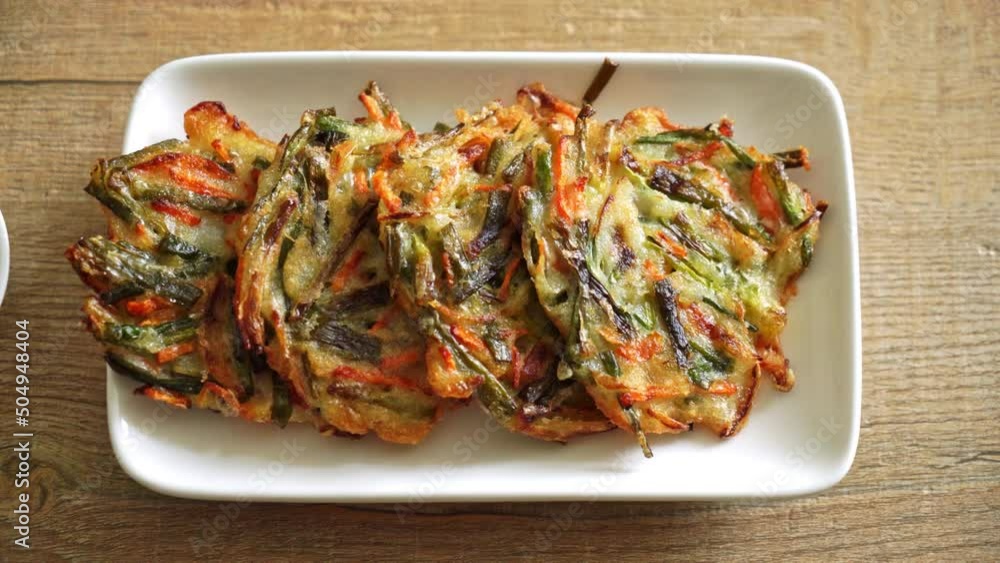 Pajeon or Korean pancake or Korean pizza - Korean traditional food style Pajeon or Korean pancake or Korean pizza - Korean traditional food style