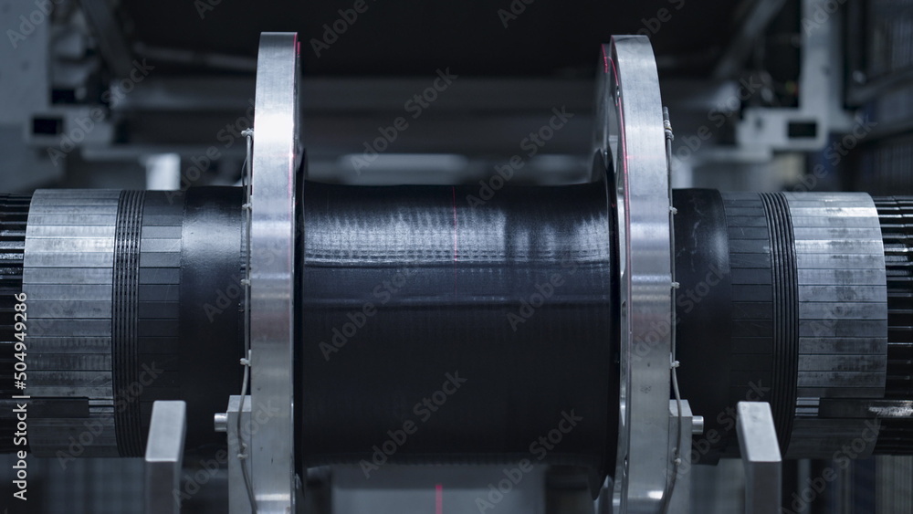 Automated tyre production technology view at modern industrial factory closeup Automated tyre production technology view at modern industrial factory closeup