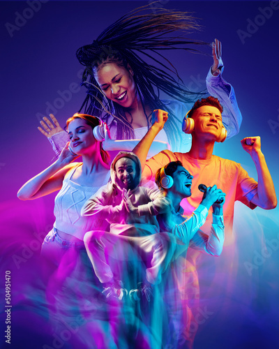 Poster with excited beautiful male and female models on dark blue color background in neon light, filter. Concept of emotions, youth, fashion, ad