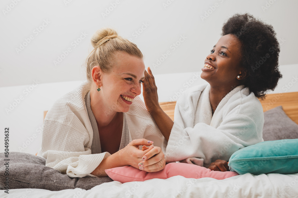 The best friends are relaxing at the spa and discussing secrets