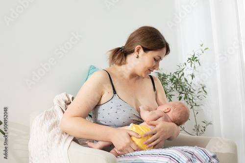 The young mom wants to breastfeed her newborn baby