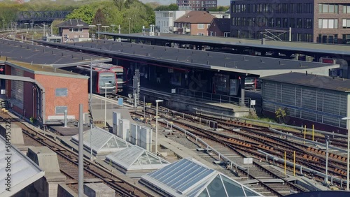Train leaving Barmbek station in Hamburg, as seen from above
