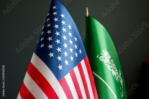 Flags of the USA and Saudi Arabia. Political relations.