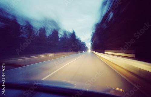 Motion blur effect driving at dusk