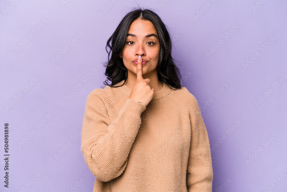 Young hispanic woman isolated on purple background thinking and looking up, being reflective, contemplating, having a fantasy. Young hispanic woman isolated on purple background thinking and looking up, being reflective, contemplating, having a fantasy.