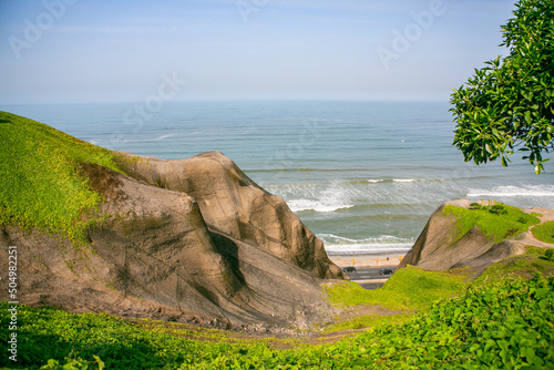 The Pacific Ocean warms the shores of Lima, the capital of Peru. Beautiful urban nature in latin America. photo