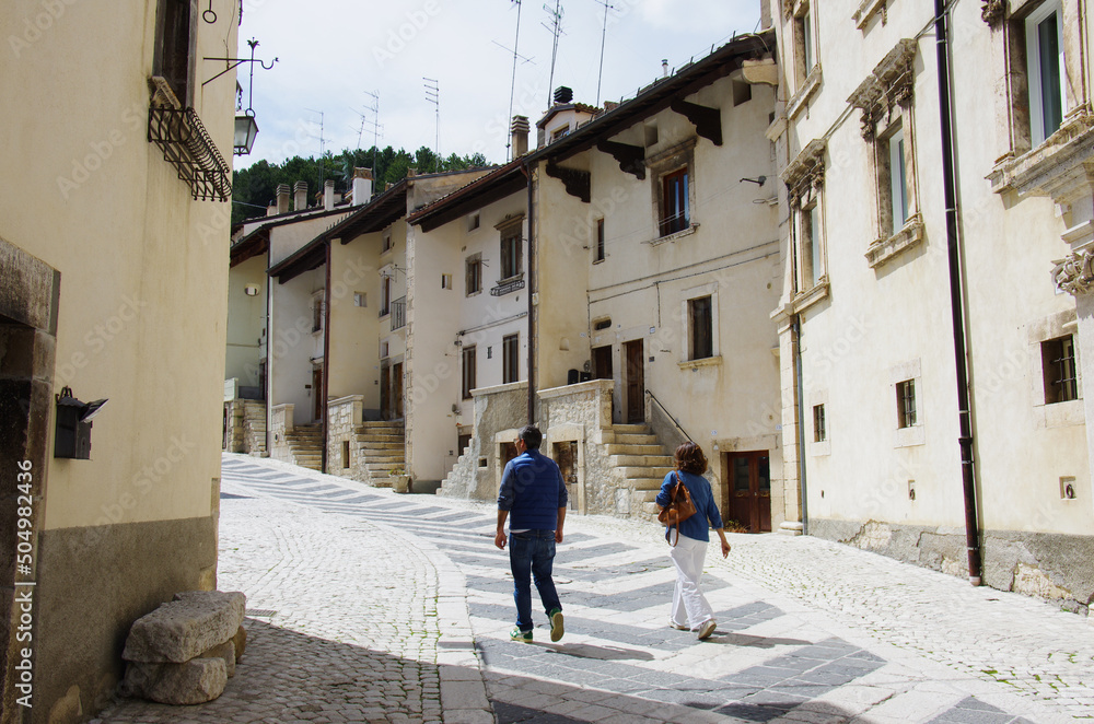 Pescocostanzo - Abruzzo - Italy - Tourists stroll in the historic center of the village