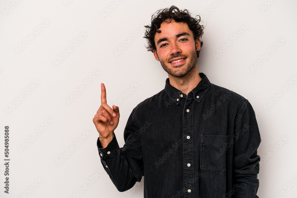 Young caucasian man isolated on white background showing number one with finger. Young caucasian man isolated on white background showing number one with finger.