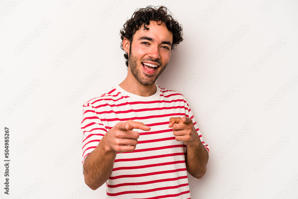 Young caucasian man isolated on white background pointing to front with fingers. Young caucasian man isolated on white background pointing to front with fingers.