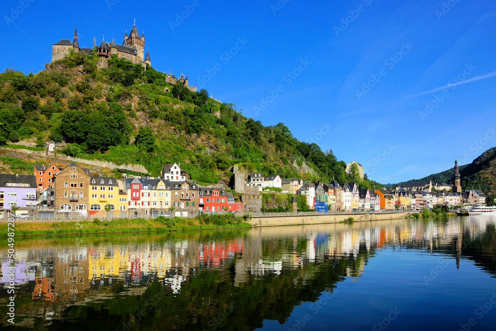 Beautiful town of Cochem, Germany with castle and early morning reflections in the Moselle River