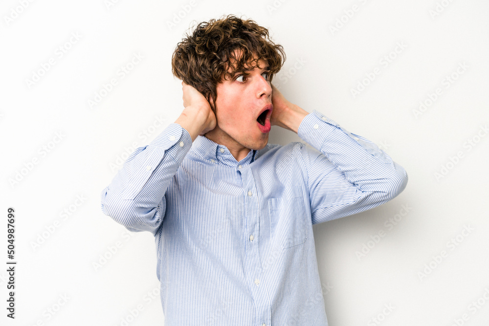 Young caucasian man isolated on white background screaming, very excited, passionate, satisfied with something. Young caucasian man isolated on white background screaming, very excited, passionate, satisfied with something.