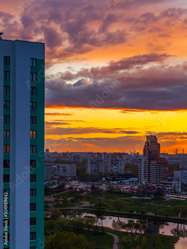 Saint Petersburg, Russia, May 7, 2022.  Multi-storey modern residential buildings in sunset time.