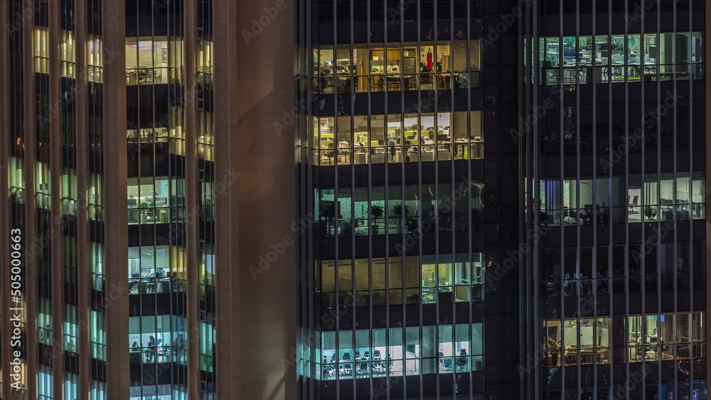 Windows lights in modern office buildings timelapse at night Windows lights in modern office buildings timelapse at night