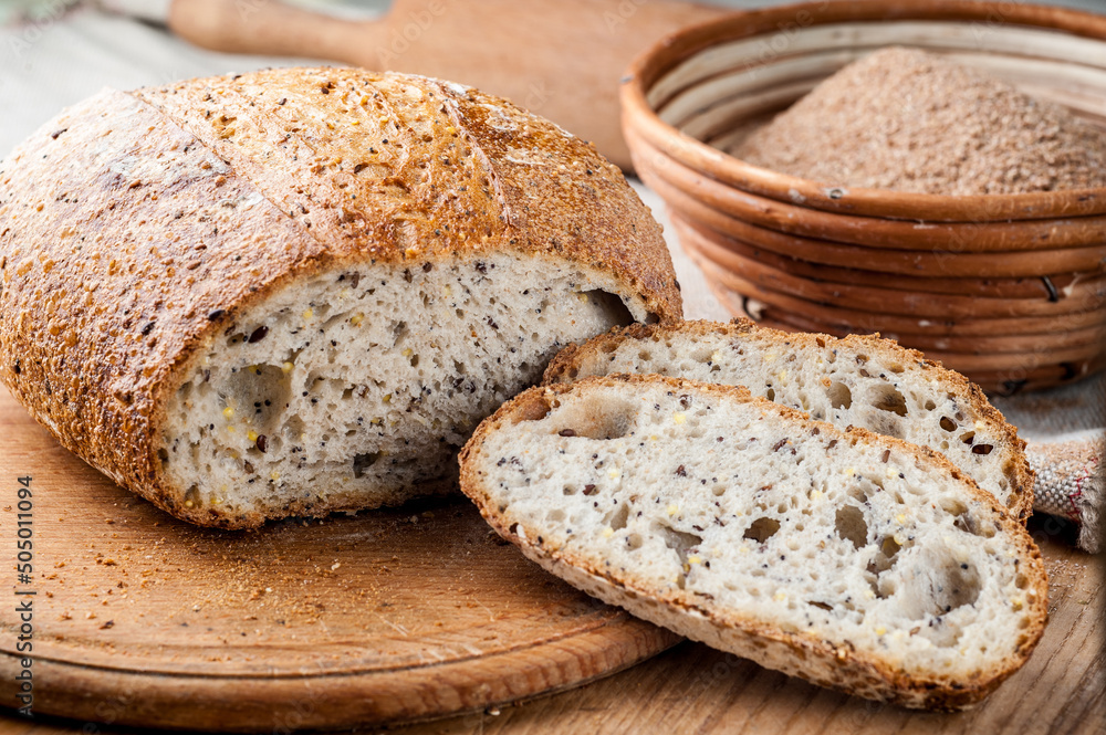 Bread. Baked bread. Craft bakery. Sliced bread on a wooden background. Food blog, food, pastries, flour, hot, fragrant, morning, fresh bread