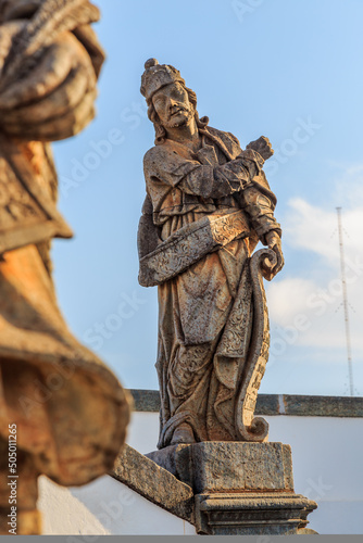 Statue of the prophet sculpted by Aleijadinho in front of the church of the sanctuary of Bom Jesus of Matosinhos at Congonhas, Minas Gerais, Brazil photo