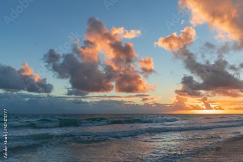 Colorful sunrise sky over Atlantic Ocean. coastal landscape of Bavaro beach