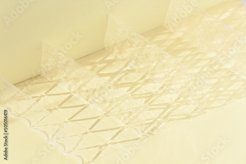 Abstract shadows background from gelly sheets in sunny day.