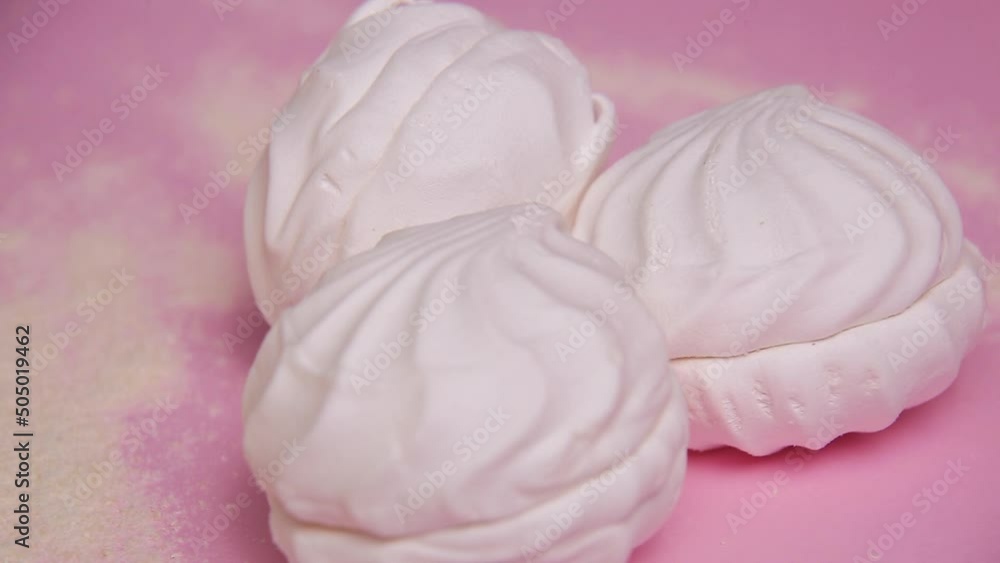 sweet white dessert on pink background sweet white dessert on pink background