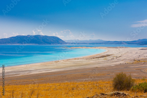 Salda Lake is a turquoise crater lake. Jezero Crater on Mars and Salda Lake in Burdur have similar geographical features and are known as Turkey's Maldives. photo