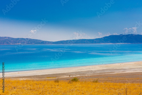 Salda Lake is a turquoise crater lake. Jezero Crater on Mars and Salda Lake in Burdur have similar geographical features and are known as Turkey's Maldives. photo