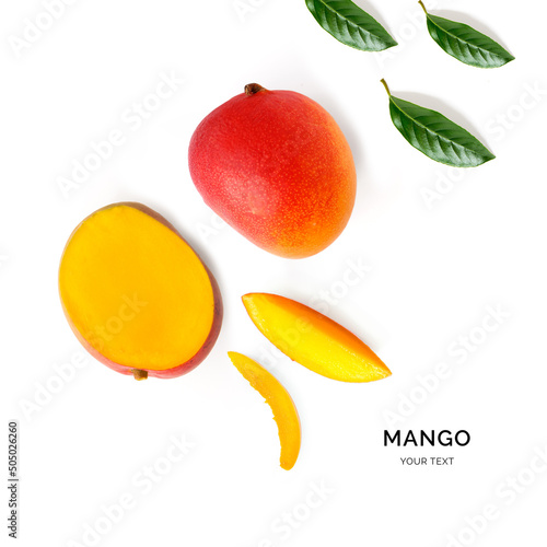 Fototapeta Naklejka Na Ścianę i Meble -  Creative layout made of mango and leaves. Flat lay. Food concept. Mango on white background.