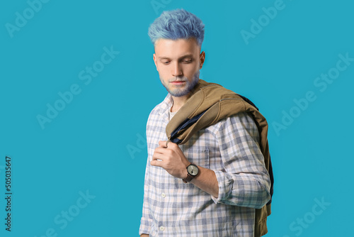 Stylish young man with unus...