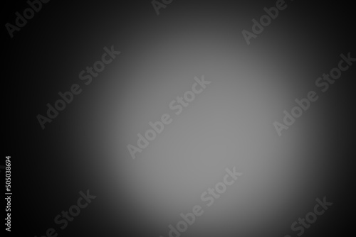 Dark black and gray blurred background has a little abstract light. soft background for wallpaper,design,graphic and presentation
