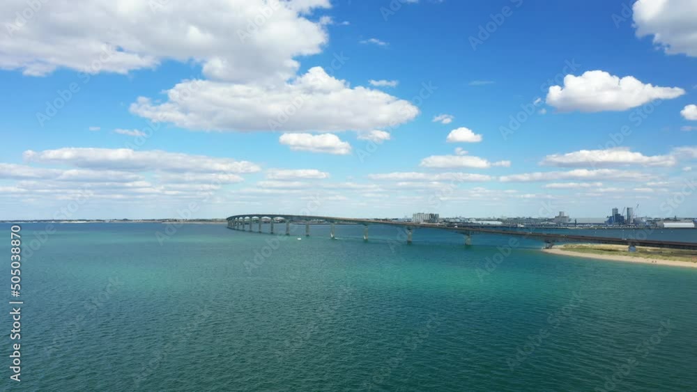The Ile de Re bridge over the Atlantic Ocean in Europe, France, New Aquitaine, Charente Maritime, in summer on a sunny day. The Ile de Re bridge over the Atlantic Ocean in Europe, France, New Aquitaine, Charente Maritime, in summer on a sunny day.