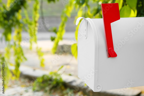 Fotografie, Obraz Mailbox with red flag outdoors