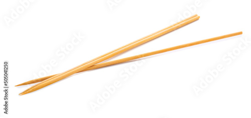 Foto Wooden skewers on white background