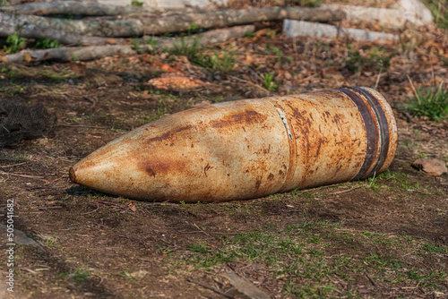 old rusty artillery shell, bomb