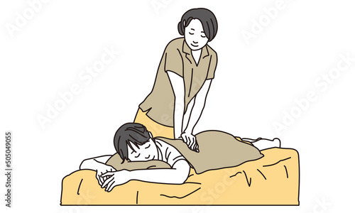 マッサージを受ける女性	
