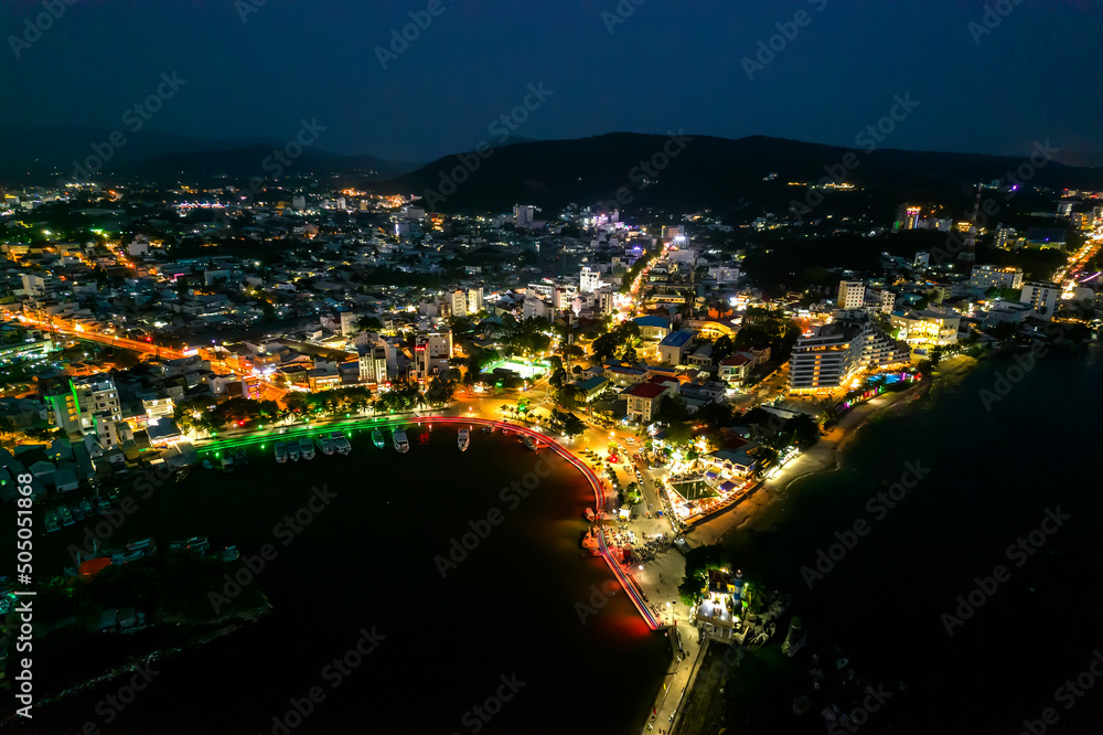 Fototapeta premium Aerial View of night Duong Dong town, Phu Quoc, Vietnam, this is central crowded and bustling in the Gulf of Thailand.