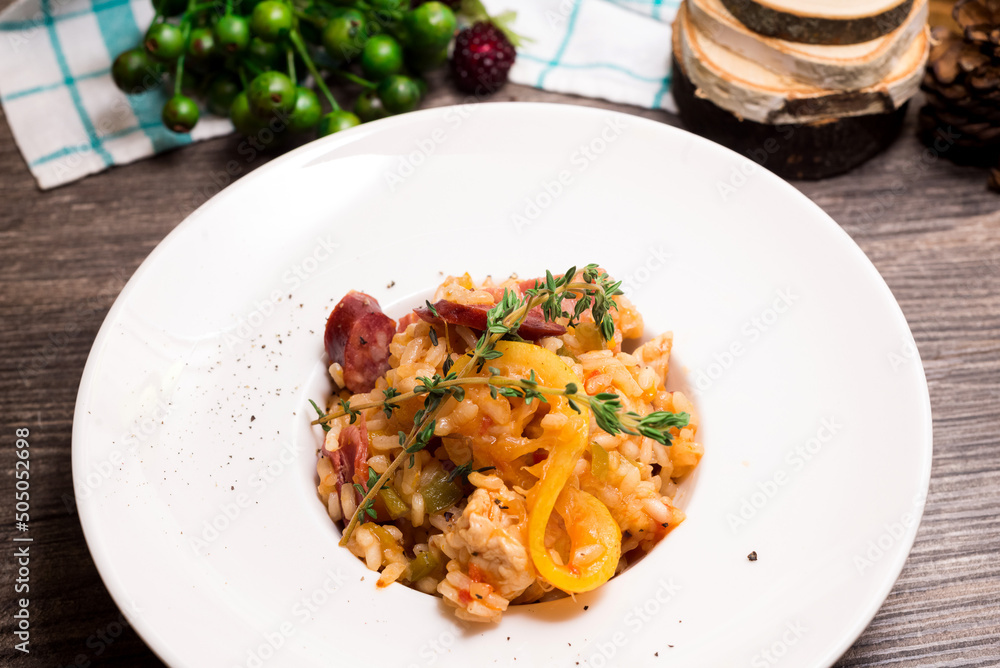 Creole Jambalaya, aka New Orleans paella, rice in tomato sauce with ham and vegetables Creole Jambalaya, aka New Orleans paella, rice in tomato sauce with ham and vegetables