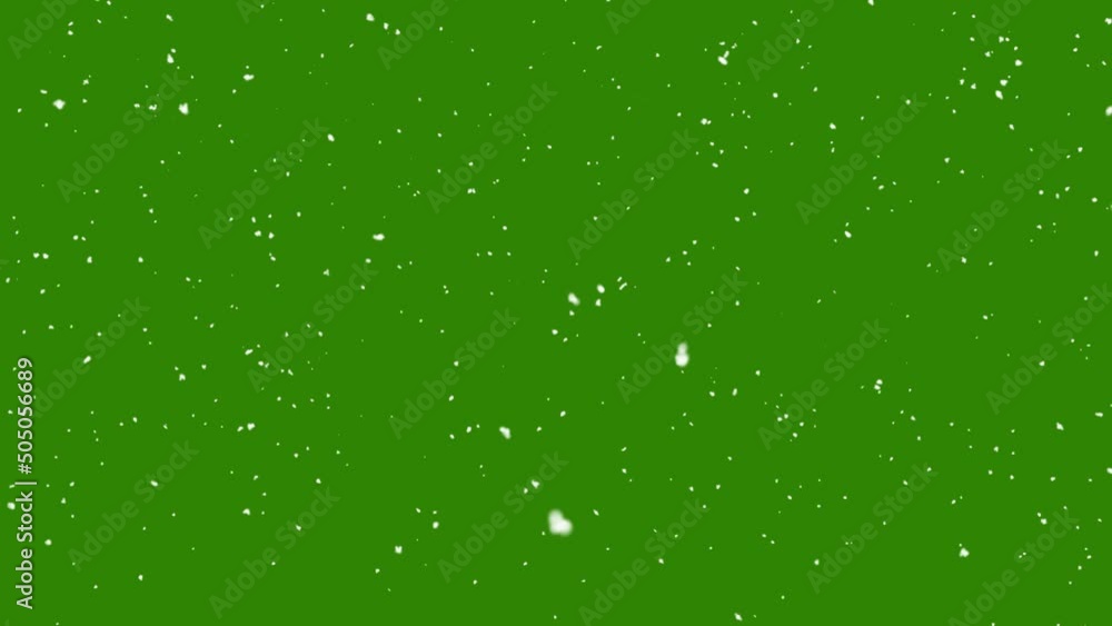 Snow falling on green background Snow falling on green background