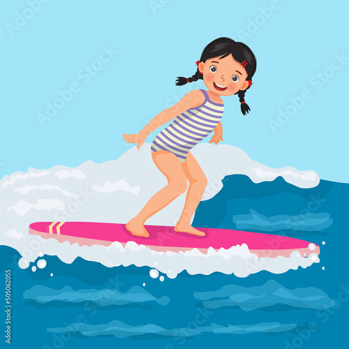 Cute little girl surfer riding on surfboard having fun on sea wave on the beach in summer vacation