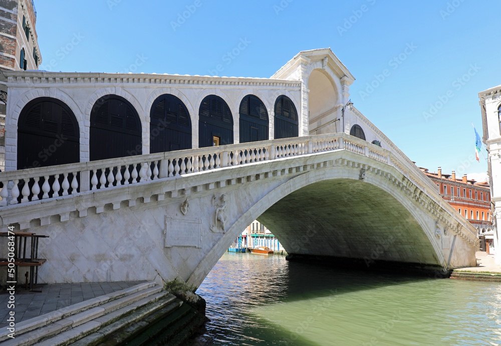 VENICE ITALY Rialto bridge amazingly without people during the lockdown that kept tourists at home and the Grand Canal without boats