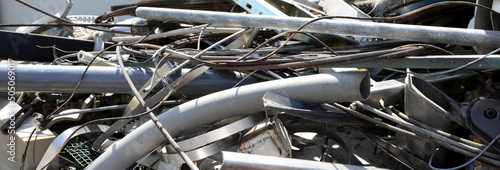 scrap metal aluminum iron and other rusted ferrous metals in a landfill photo